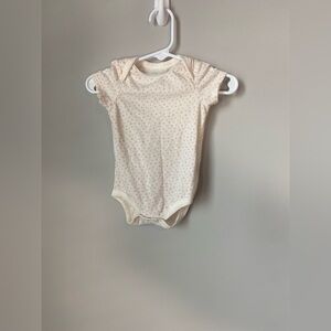 Charming Cream Baby Onesie with Pink Dots